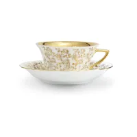 Zdjęcie Filiżanka do herbaty Windsor ze spodkiem z porcelany w kolorze białym zdobiona złotymi kwiatami – Leander