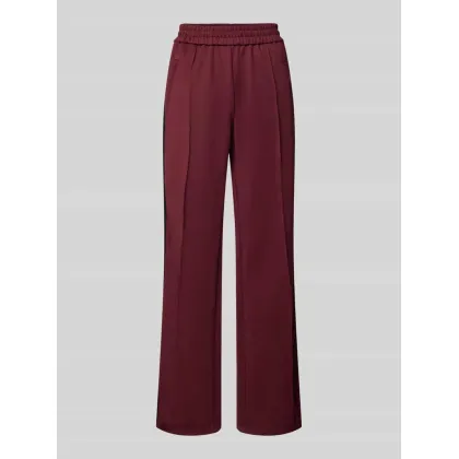 Zdjęcie Spodnie typu track pants o luźnym kroju z paskami w kontrastowym kolorze model ‘WARM UP X’