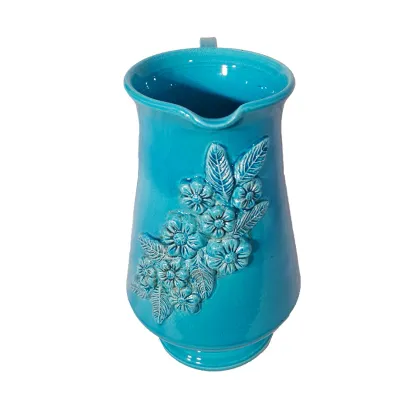 Picture Italian blue ceramic jug decorated with a beautiful floral motif