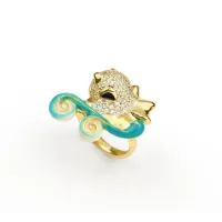 Picture Stylish adjustable ring in 18K gold-plated sterling silver, finished with white zircons and turquoise enamel