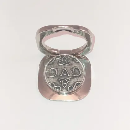 Picture A mobile phone holder with a decorative