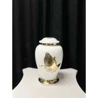 Zdjęcie Wyjątkowa biało-złota urna pogrzebowa