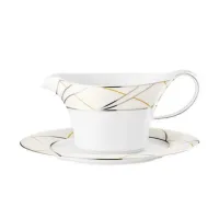 Picture A beautiful modern sauce boat decorated with a beautiful cream and silver decoration - Tettau