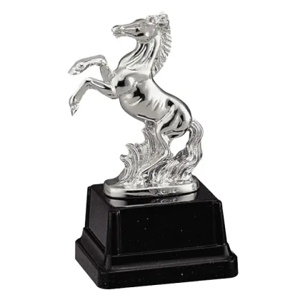 Picture A statuette with a horse on the desk