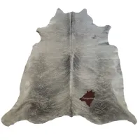 Picture A stunning cowhide rug for the living room