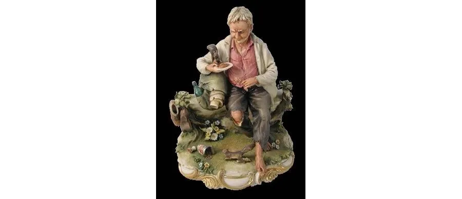 obrazek 1 Porcelanowy mężczyzna z wiewiórką