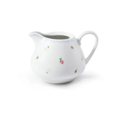 Picture Stylish porcelain milk jug decorated with a floral motif - Leander