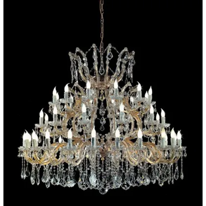 Zdjęcie Luksusowy żyrandol Mariateresa z pozłacaną metalową ramą pokrytą szklanymi ramionami i przezroczystymi kryształowymi zawieszkami - Il Paralume Marina