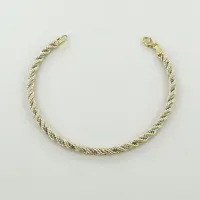 Picture Elegant string bracelet in yellow and white gold