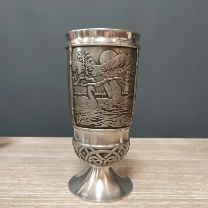 Picture A pewter cup with a depiction of the Irish story Children of Lir