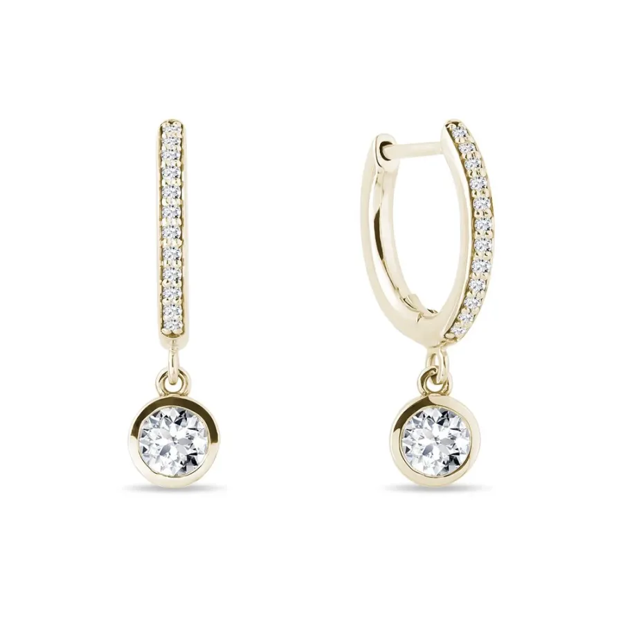 obrazek 1 Kolczyki z żółtego złota z diamentami w oprawie typu bezel KLENOTA