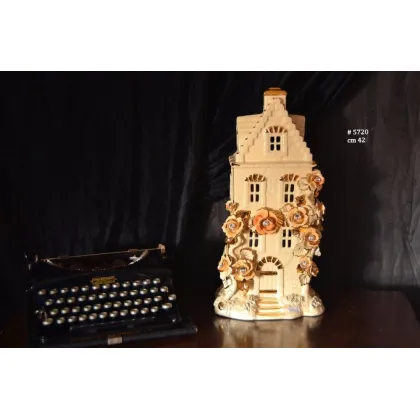 Picture A wonderful decoration - a ceramic house with floral decorations