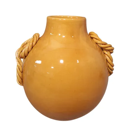 Picture An Italian ceramic vase with a round shape and a rope decoration