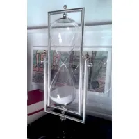 Picture An elegant desk hourglass for the President on a wooden stand