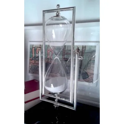 Picture An elegant desk hourglass for the President on a wooden stand