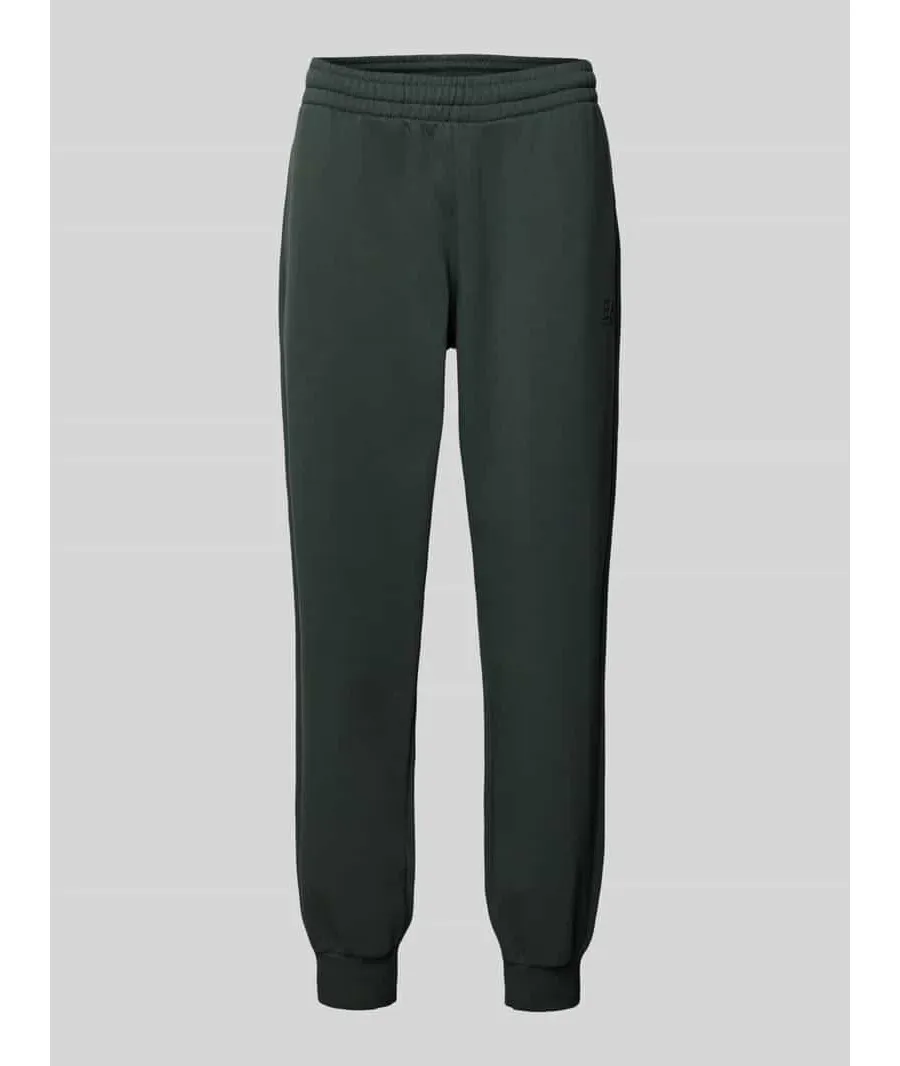 obrazek 1 Spodnie dresowe o kroju relaxed fit z nadrukiem z logo model ‘TRAIN VISIBILTY’