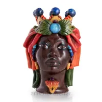 Picture A ceramic head of a Moorish woman referring to the rule of the Moors in Sicily