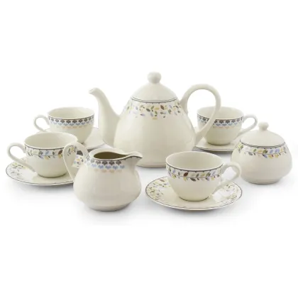 Zdjęcie Piękny 11-elementowy zestaw do herbaty z porcelany w kolorze kości słoniowej zdobiony subtelnym motywem – Leander
