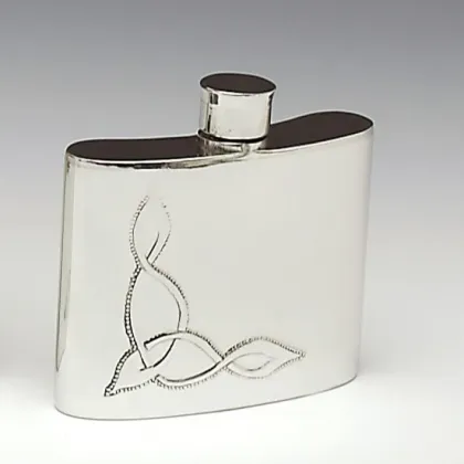 Picture A 4 oz Irish hip flask decorated with a pattern from the Book of Kells