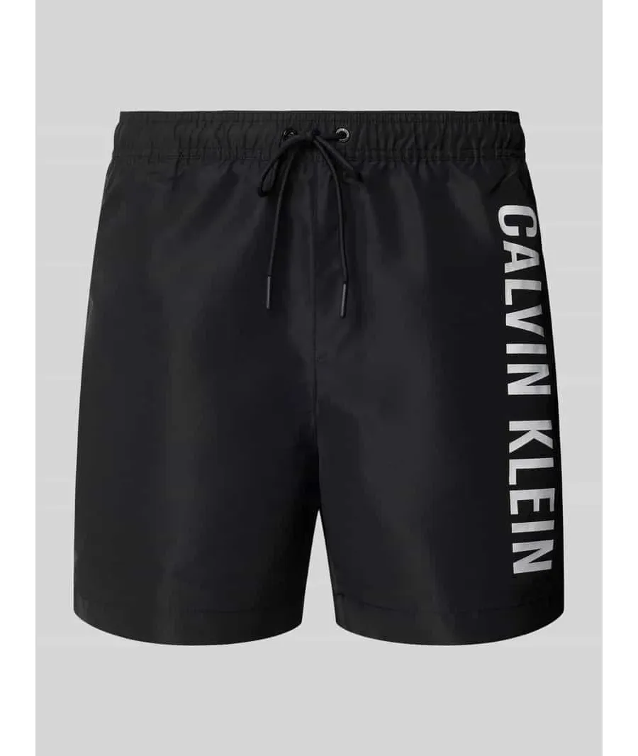 obrazek 1 Spodenki kąpielowe o kroju regular fit z nadrukiem z logo