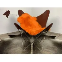 Picture Orange sheepskin rug for the living room