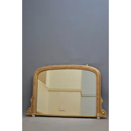 Zdjęcie Wiktoriańskie pozłacane o łukowatej formie lustro na porcelanowych nóżkach - antyk