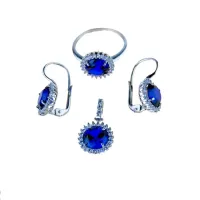 Picture Italian set of earrings with a hook, a pendant and a ring with a round blue stone, diameter. 8mm. and zircons