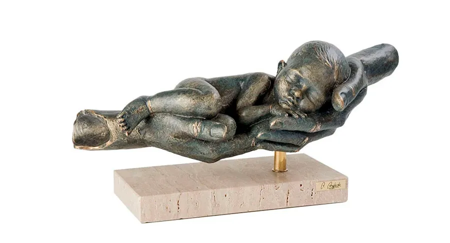 picture 1 A child sleeping in his hands - decorative sculpture