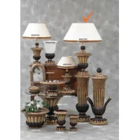 Picture A tasteful ceramic lamp with a cat accent