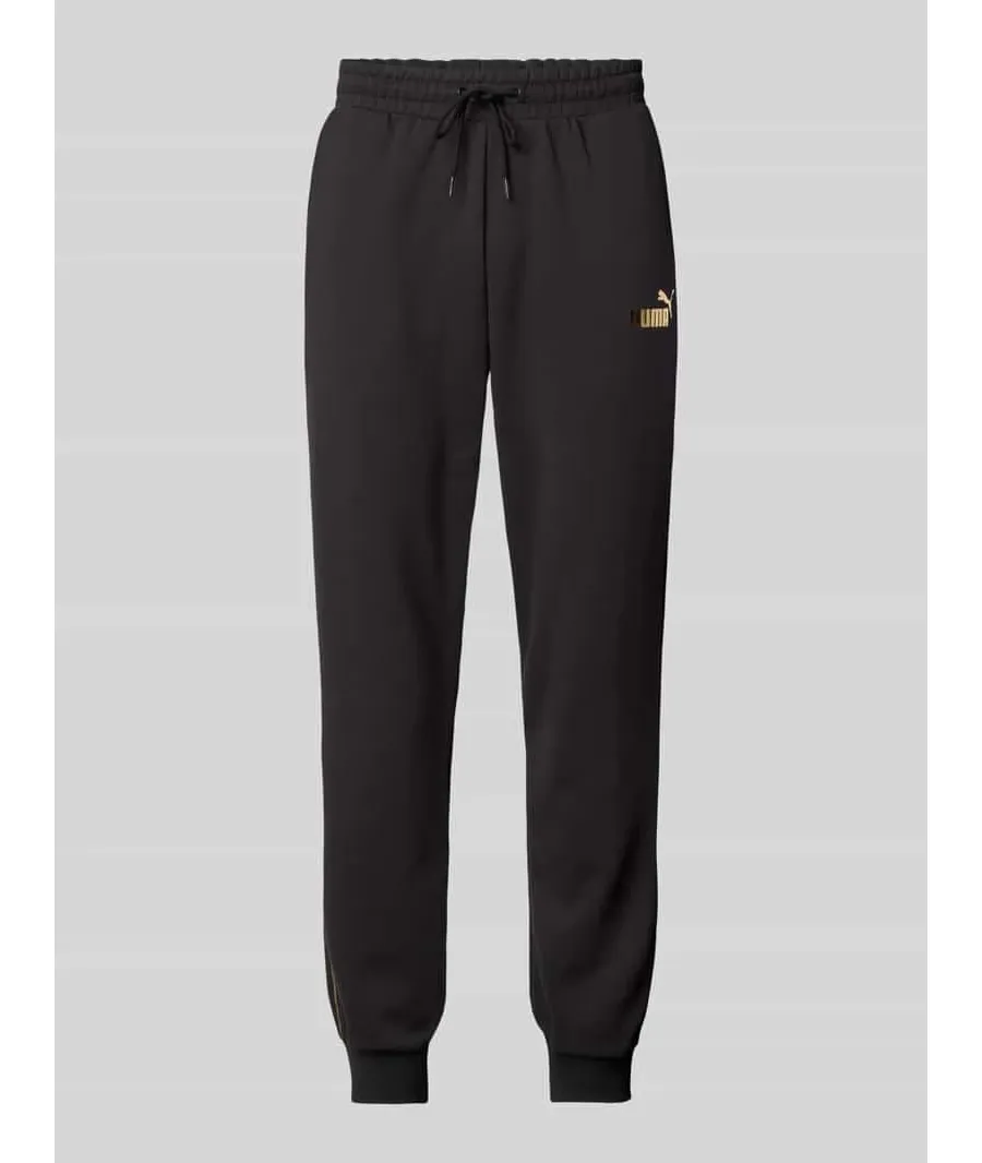 obrazek 1 Spodnie dresowe o kroju relaxed fit z nadrukiem z logo