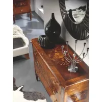 Picture Luxurious chest of drawers made of olive and rosewood in an antique style for the bedroom