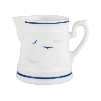Picture A unique porcelain cream jug decorated with a subtle bird motif - Tettau