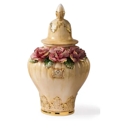 Picture A large decorative vase with an opening lid