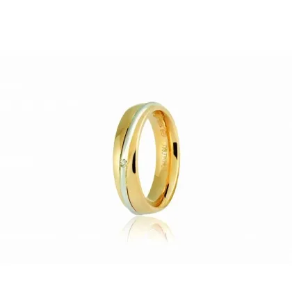 Zdjęcie Elegancka Obrączka Saturn Unoaerre z białego i żółtego złota o średnicy 1 0,01 karata i szerokości 5 mm.