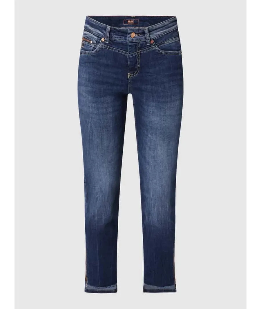 obrazek 1 Jeansy o kroju slim fit z kieszenią zapinaną na zamek błyskawiczny