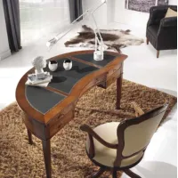 Picture Antique crescent-shaped walnut desk with leather top