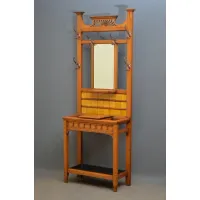 Picture Stylish Arts and Crafts oak stand with carved sun decorations on top