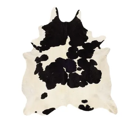 Picture Luxurious cowhide rug in natural colors