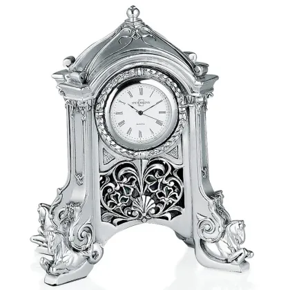 Picture A charming silver-plated clock for the living room