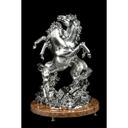 Picture A stylish pair of silver resin horses with a marble base and crystal legs