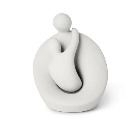 Zdjęcie Ceramiczna rzeźba, figurka macierzyństwa o wielkiej wartości symbolicznej