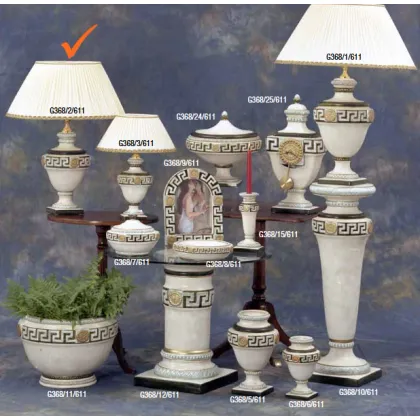 Picture A tasteful lamp with a white lampshade