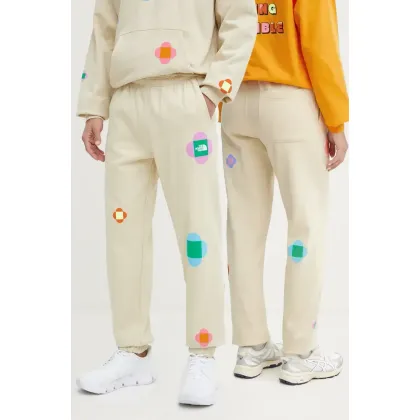 Zdjęcie The North Face spodnie dresowe bawełniane TNF x Yinka Ilori kolor beżowy z nadrukiem NF0A8AQ23X41