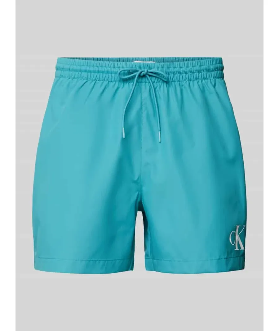 obrazek 1 Spodenki kąpielowe o kroju regular fit z nadrukiem z logo