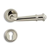 Picture Tudor door handle with a round plate and a rosette for a key or cylinder