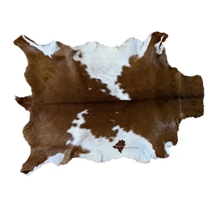 Zdjęcie Oryginalny dywan w kolorze brązowo-białym ze skóry
