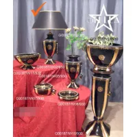 Zdjęcie Elegancka ceramiczna czarna lampa ze złotem