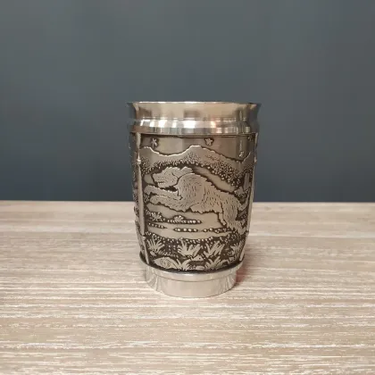 Picture A tin mug depicting the Irish story of Culainn's dog