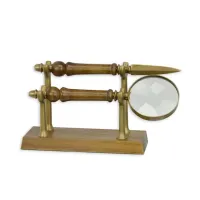 Picture A magnifying glass and a letter opener on a unique stand