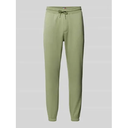 Zdjęcie Spodnie dresowe o kroju slim fit z zaznaczonym rozporkiem